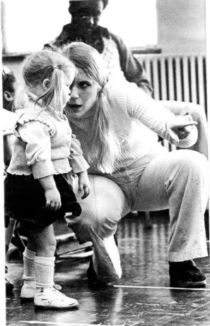 Mandy at Elaine Clark Center, listening to her teacher.